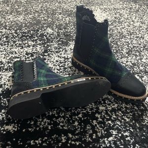 Plaid boots.